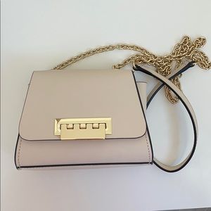 Zac Posen cream crossbody with gold accents